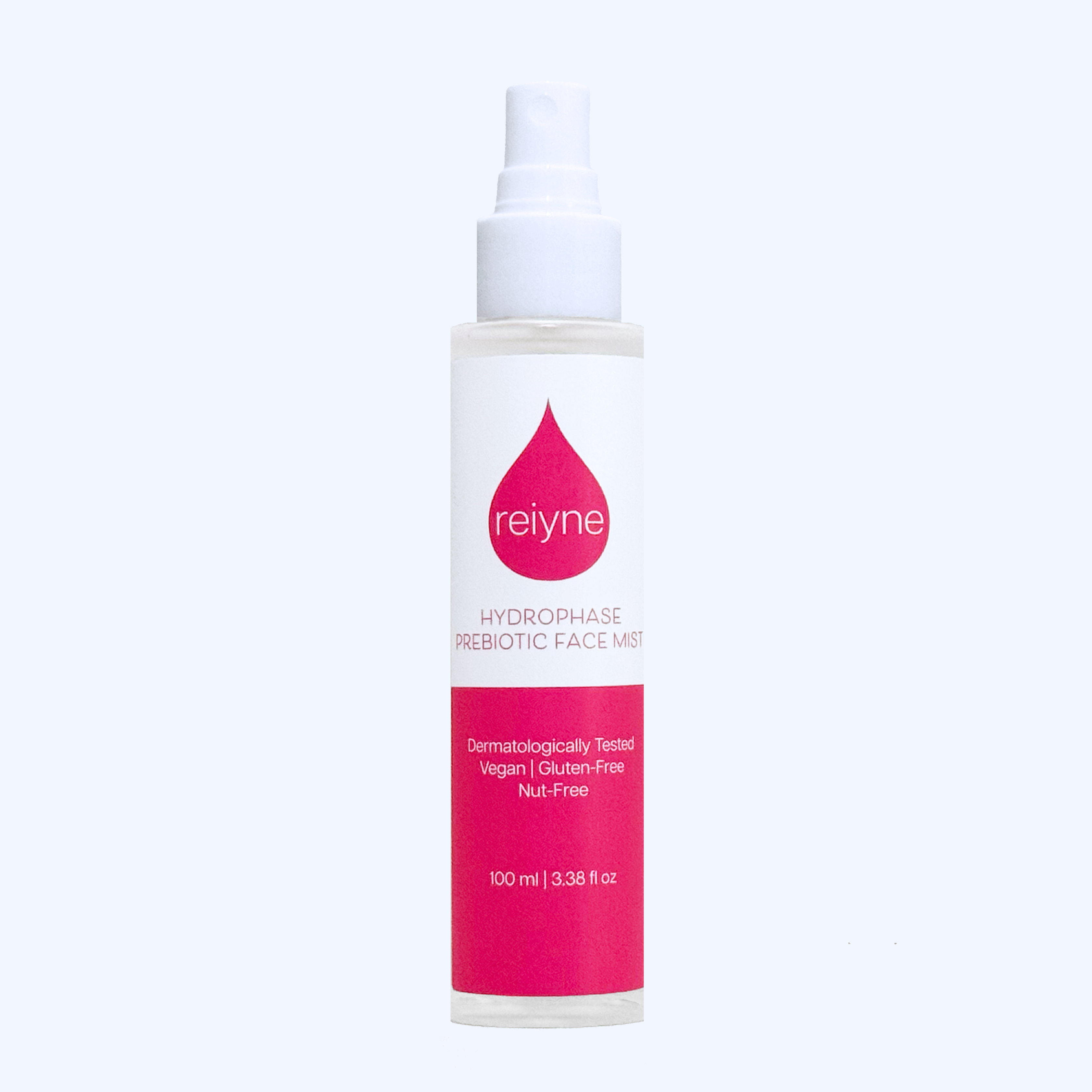 Reiyne HydroPhase Prebiotic Face Mist in a white pump bottle and a pink and white label
