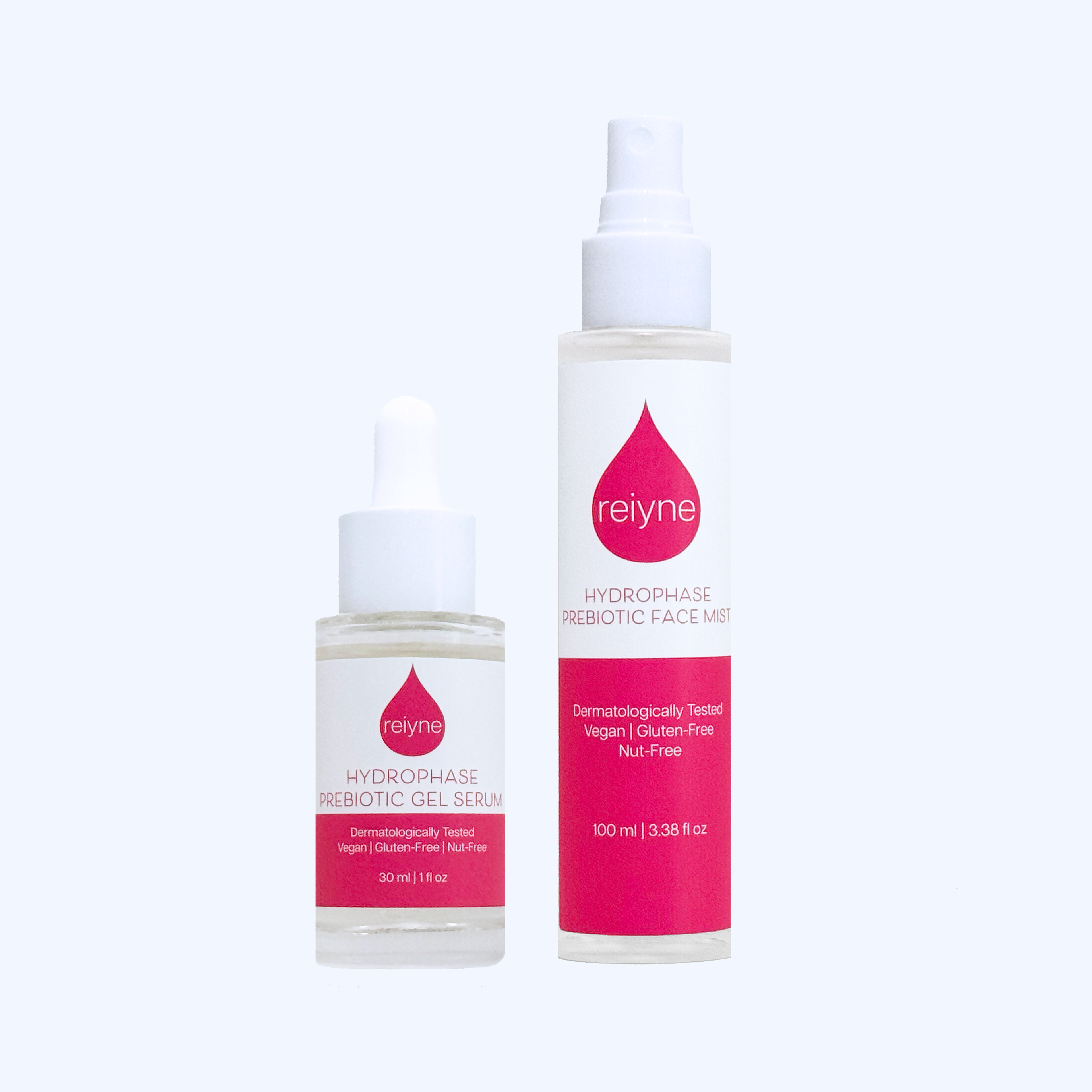 Reiyne HydroPhase Prebiotic Face Mist with HydroPhase Gel Serum in a white pump bottle and a pink and white label
