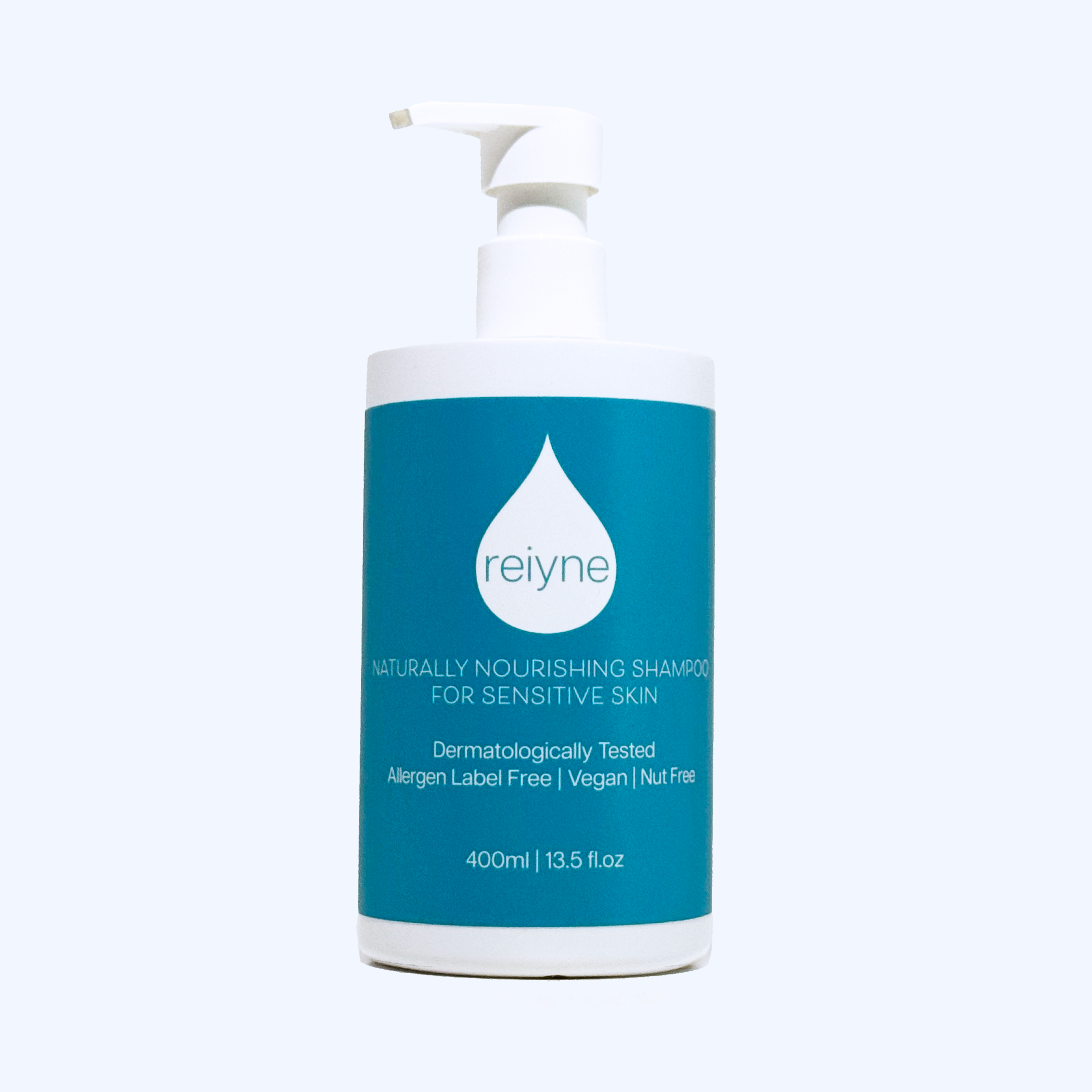 Reiyne Naturally Nourishing Shampoo for Sensitive Skin in a white pump bottle with Blue and white label