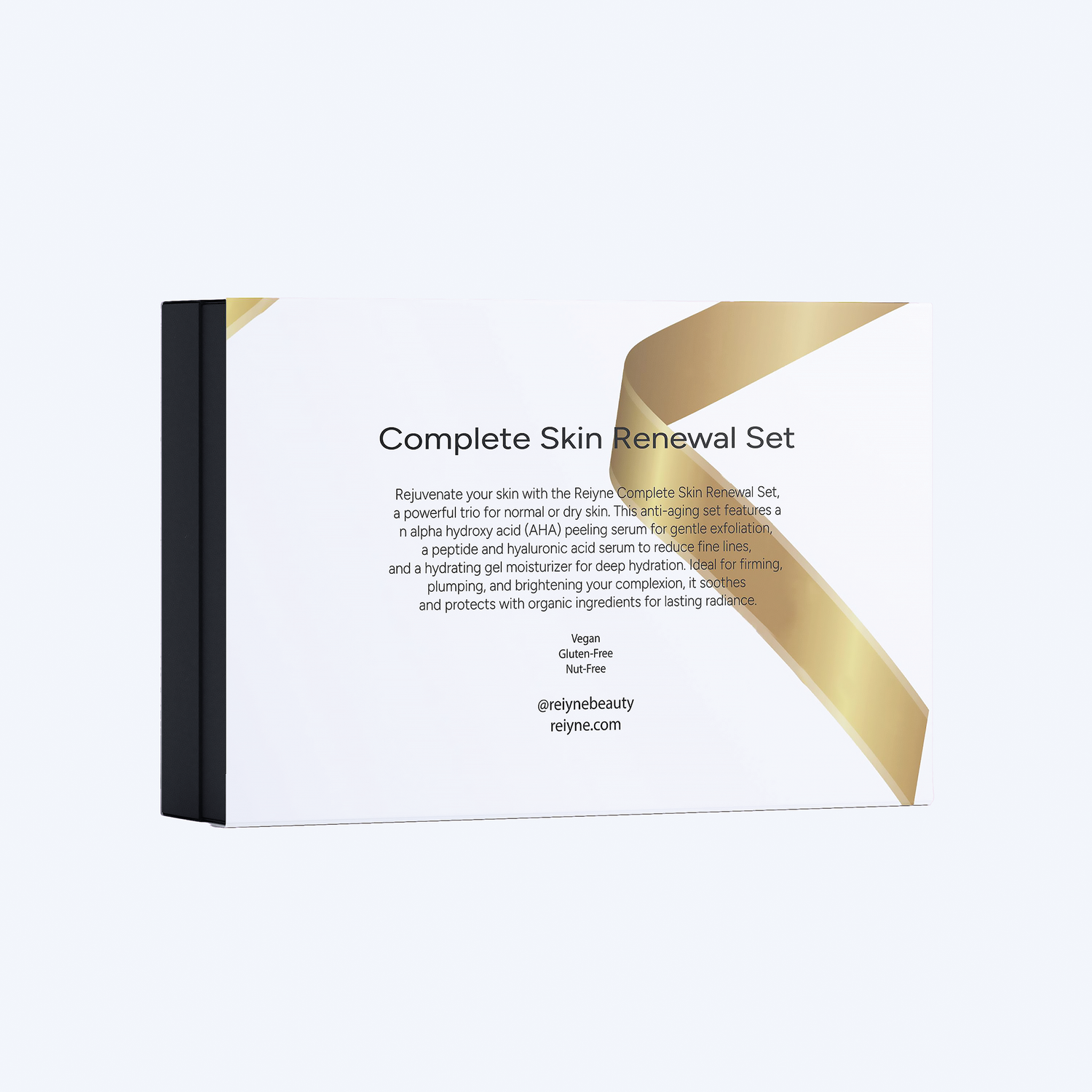 Complete Skin Renewal Set packaging with gold ribbon on a white background