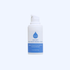 Reiyne Age Defy Daily Moisturizer in a white airless pump bottle with blu and white label on a grey background