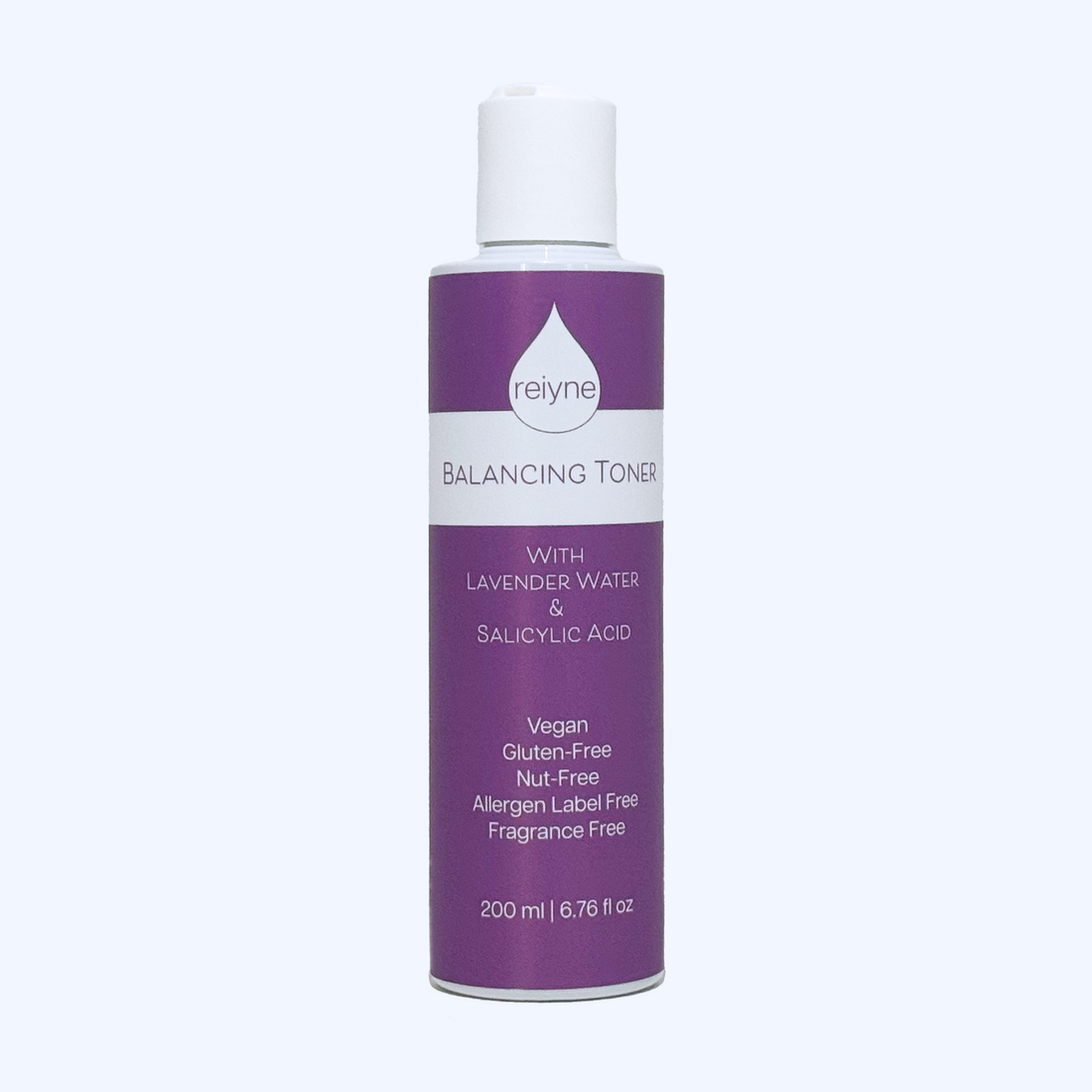 Reiyne Balancing Toner with Lavender and Salicylic Acid in a white bottle with purple and white label