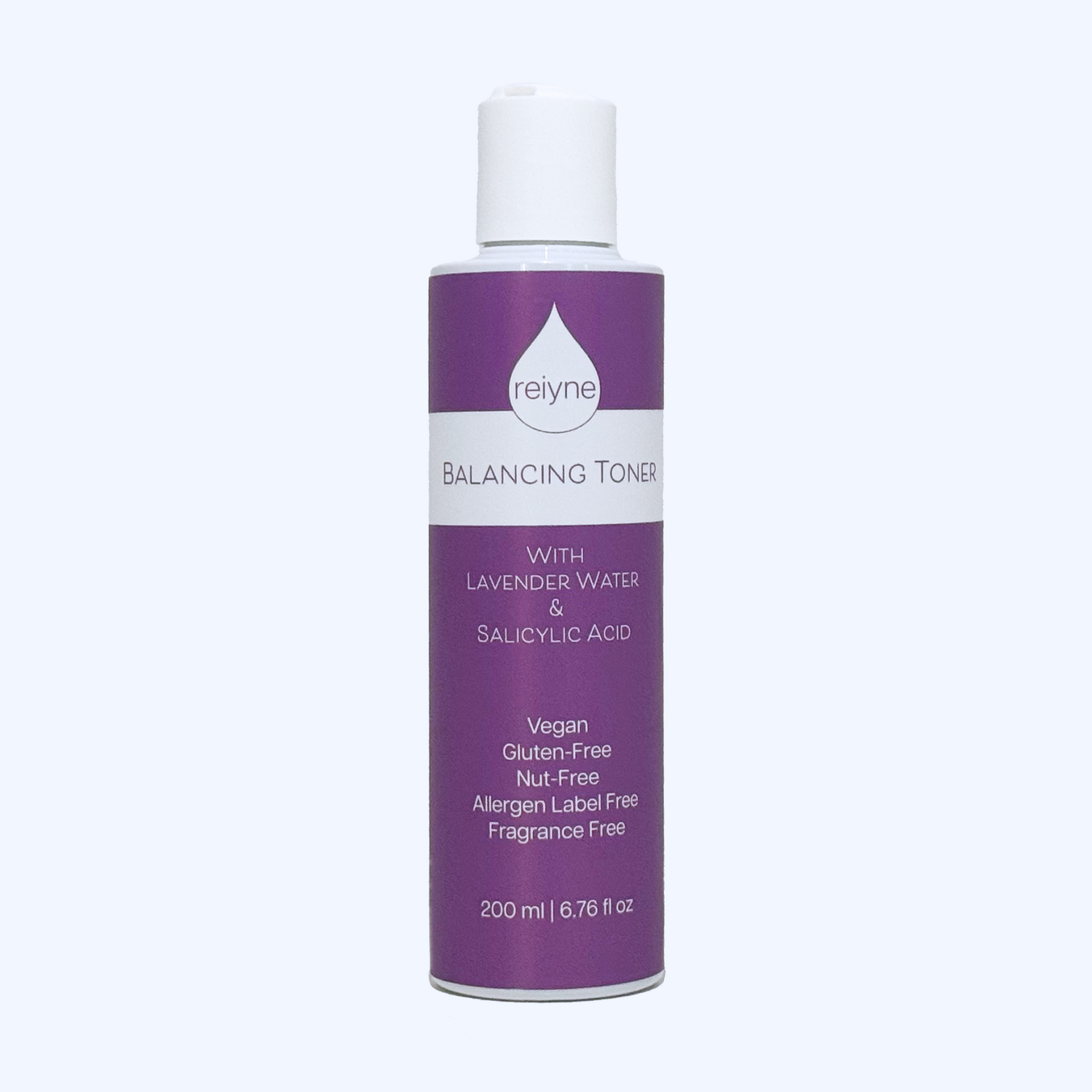 Reiyne Balancing Toner with Lavender and Salicylic Acid in a white bottle with purple and white label