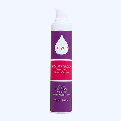 Reiyne Beauty Sleep Ceramide Night Cream in a white airless pump bottle and a purple pink and white label