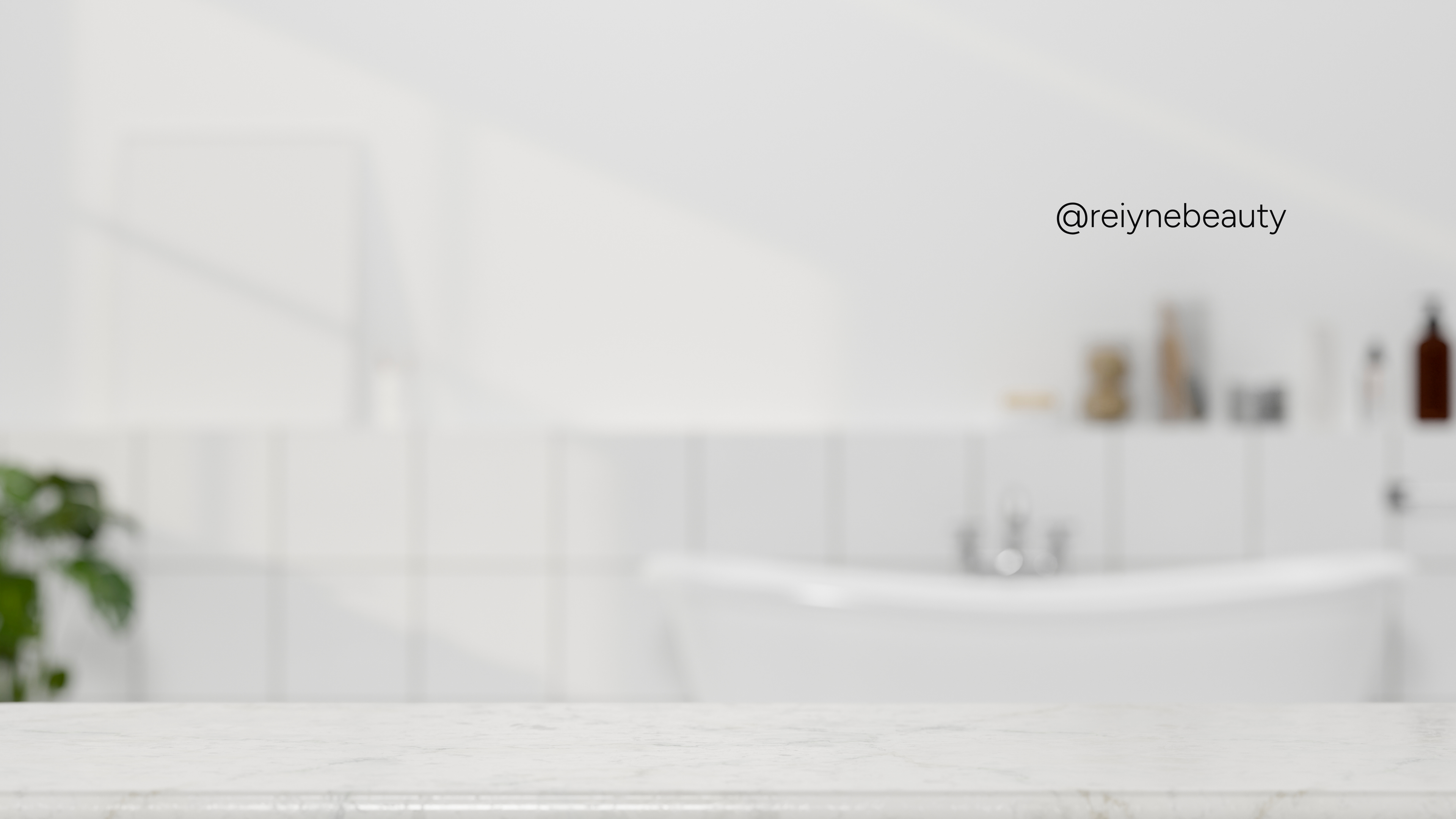 Reiyne_Clean_Beauty_Skincare_Contact_Us_form on the background of a blurry white spa bathroom