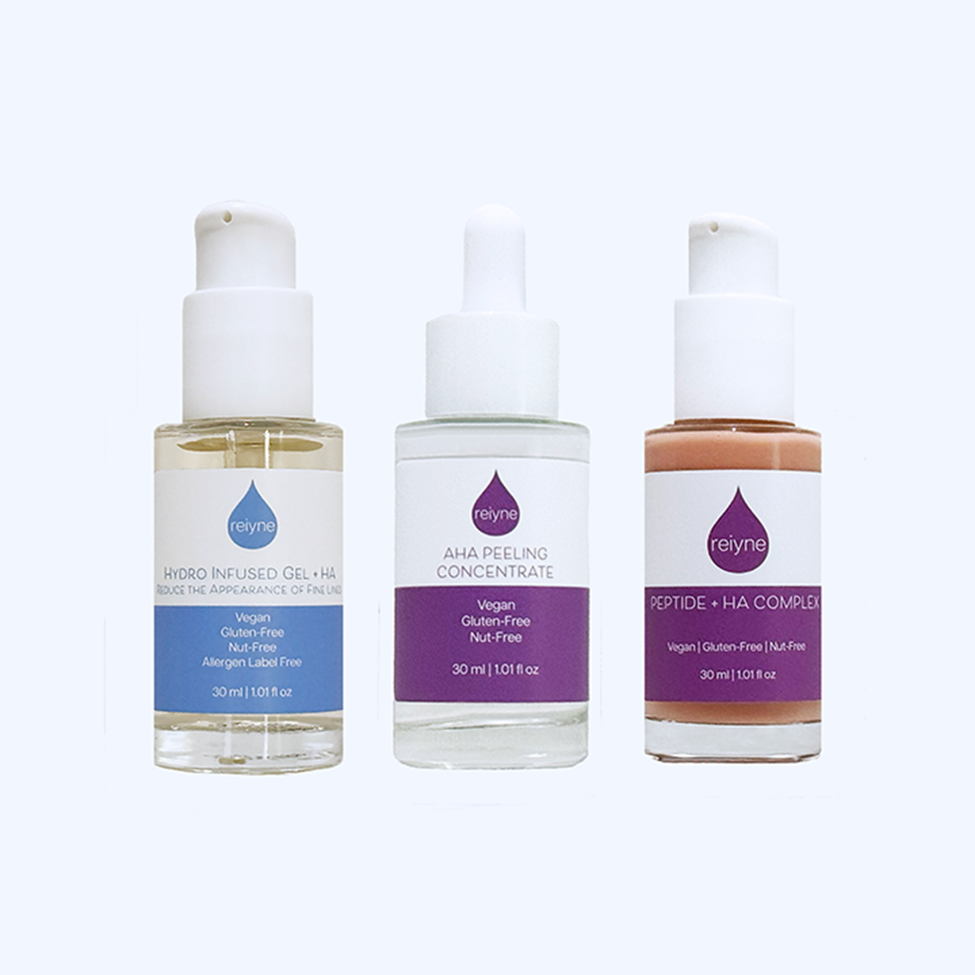 Reiyne Complete Skin Renewal Set front of purple box with hydro infused Gel plus HA, peptide plus HA Complex and AHA Peeling Concentrate