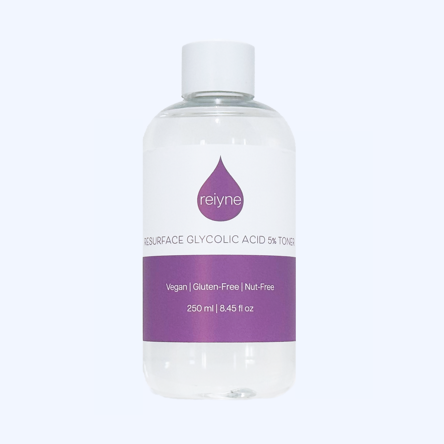 Reiyne Resurface Glycolic Acid Toner in a clear bottle with white cap and purple and White label