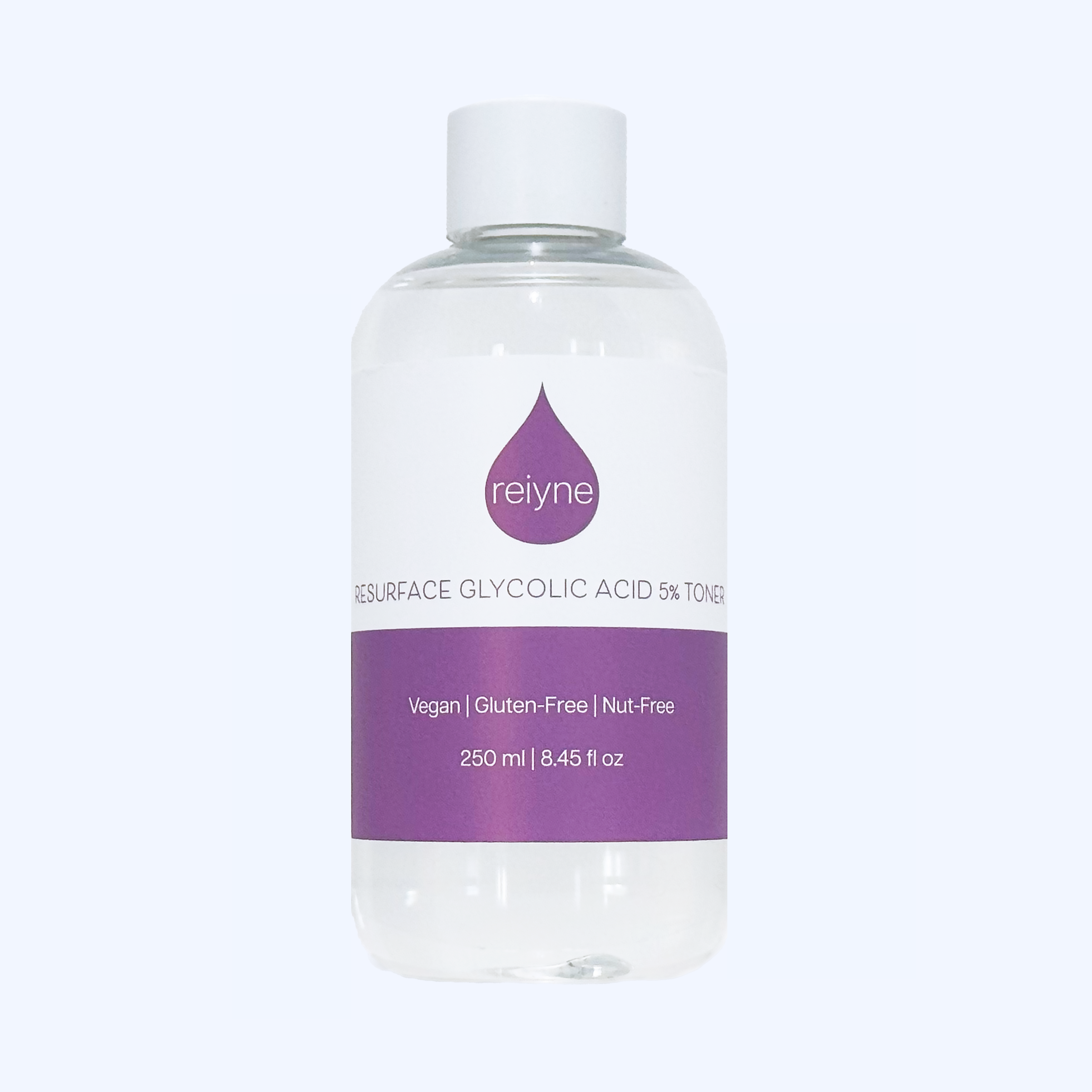 Reiyne Resurface Glycolic Acid Toner in a clear bottle with white cap and purple and White label
