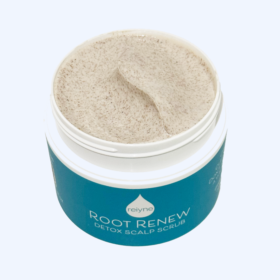 Reiyne Root Renew Detox Scalp Scrub in a white jar with a Blue and white label