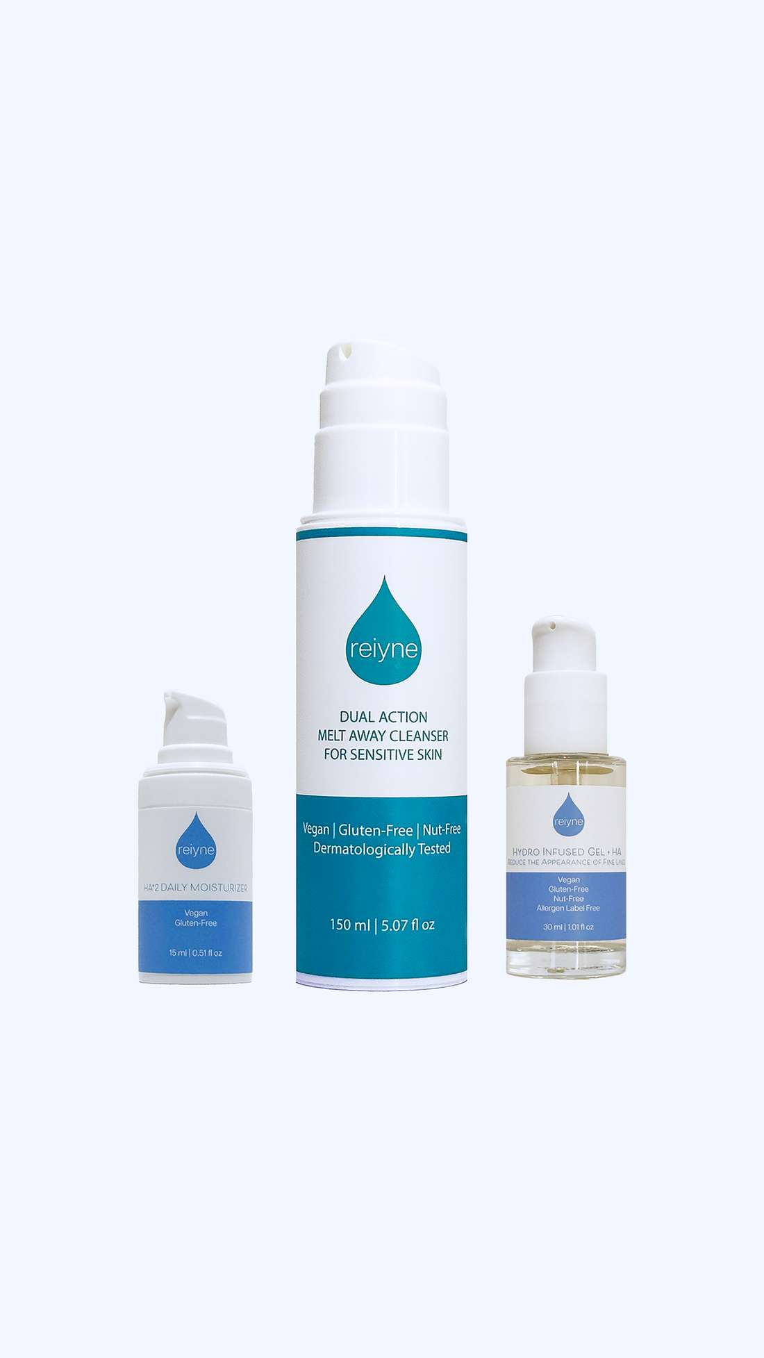 Reiyne Unbothered Glow Kit contains dual action melt away cleanser for sensitive skin in a blue an white airless pump bottle, HA*2 Daily Moisturizer in a blue and white airless pump bottle and Hydro infused Gel in a blue and white airless pump bottle